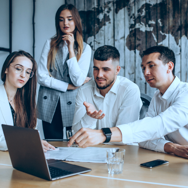 group-people-working-out-business-plan-office