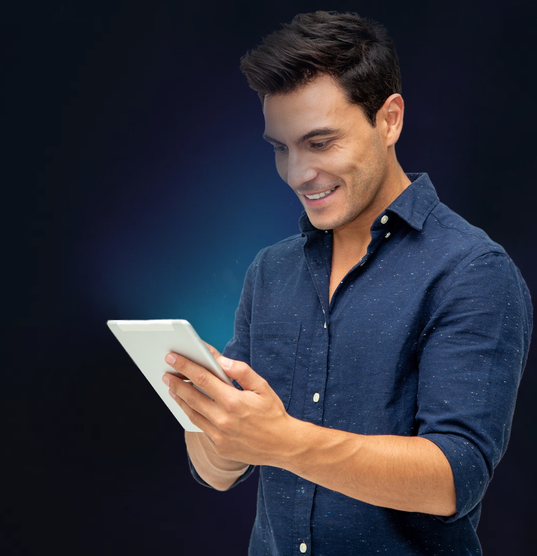 A man is looking on his tablet and improving his business
